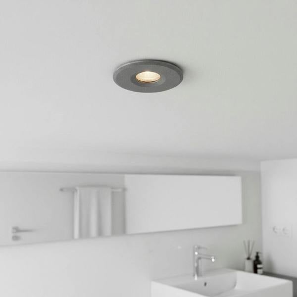 grey small recessed bathroom ceiling light installed on a modern bathroom ceiling