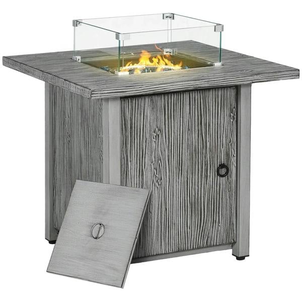 Grey gas fire pit table with glass screen and hinged cover panel, open flame visible