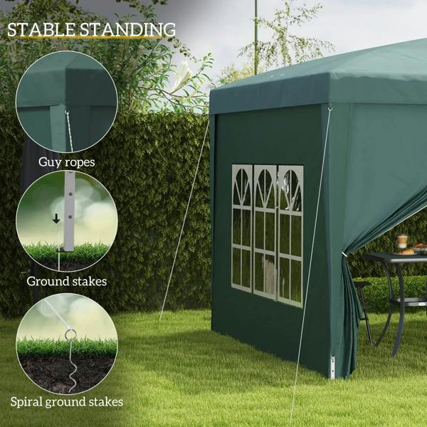Green gazebo canopy tent with guy ropes and ground stakes for stability