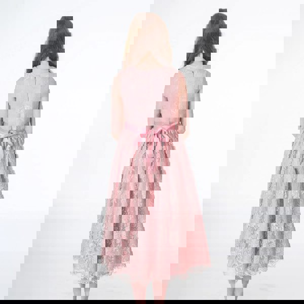 girl in dusky pink dress