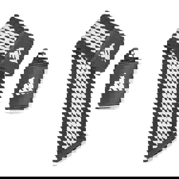 Black and white striped adidas wrist wraps with adidas logo on a white background