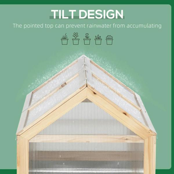 Wooden cold frame greenhouse with slanted top cover to help shed rainwater