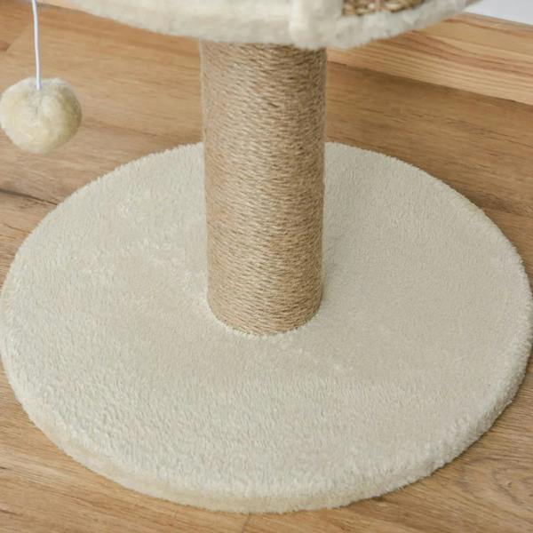 Close-up of beige round base with sisal-wrapped vertical post