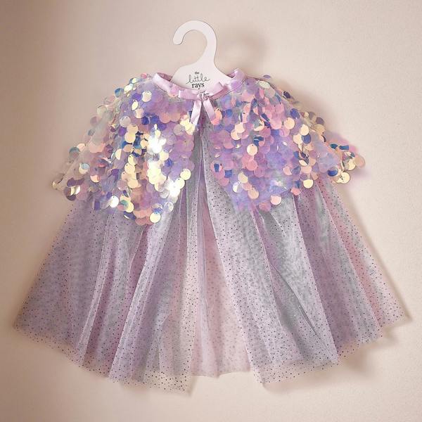 Purple tulle children's mermaid costume cape hanging from a white brand coat hanger against a textured wall.