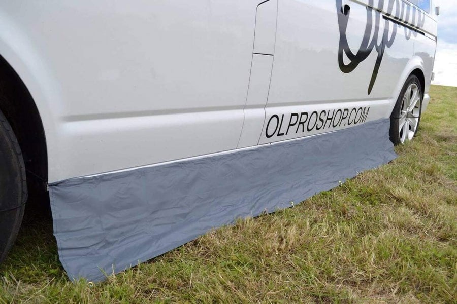 An image of the Awning Skirt and Draught Excluder Size Small from OLPRO attached to a VW Campervan.