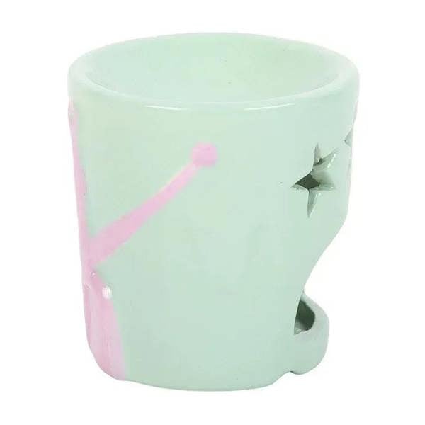 Pastel ceramic oil burner bucket with star-shaped cutouts