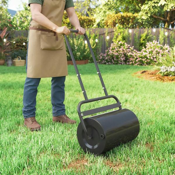 Black steel lawn roller with front wheel and curved handle for pushing on turf
