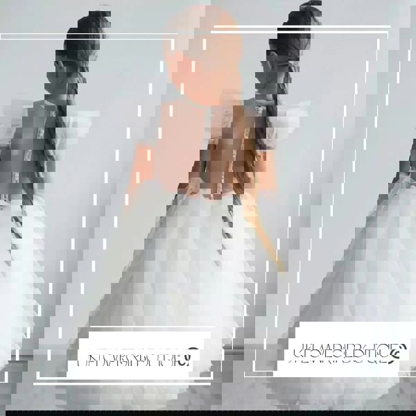 Young girl wearing occasion dress