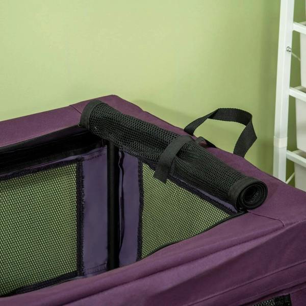 Close-up of purple pet carrier top panel with rolled mesh and carry straps