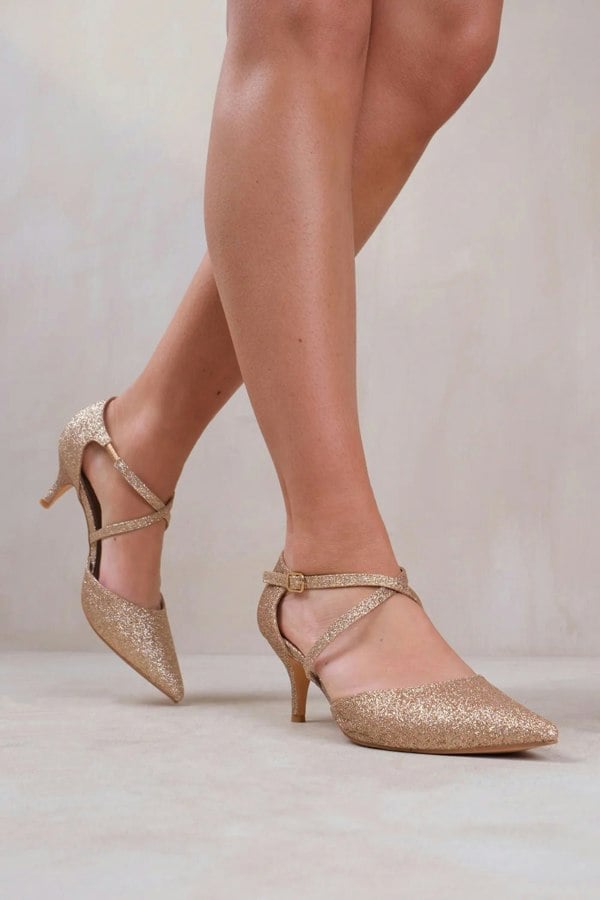 Where's That From Kennedi Wide Fit Low Kitten Heel With Crossover Strap in Gold Glitter