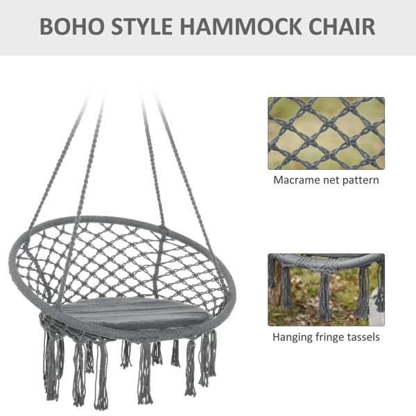 Grey macrame hanging rope chair with circular net seat, hanging fringe tassels, and cushion