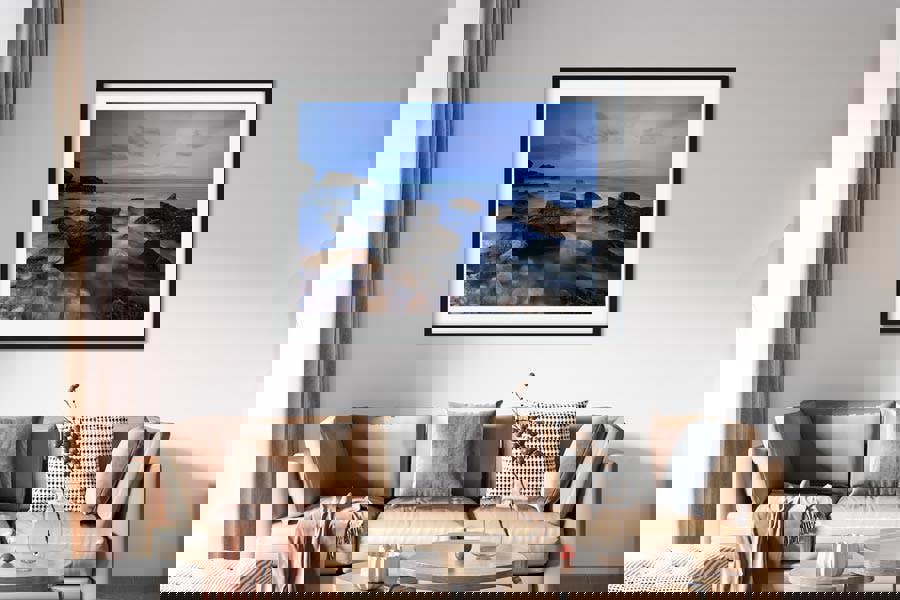 framed artwork of blue seascape coast photograph