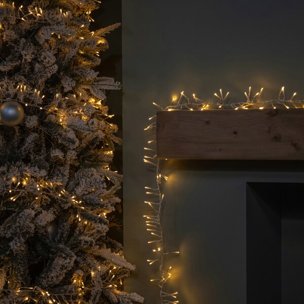 Samuel Alexander 9.3m 720 LED Christmas Cluster String Lights with Timer in Vintage Gold on Clear Cable