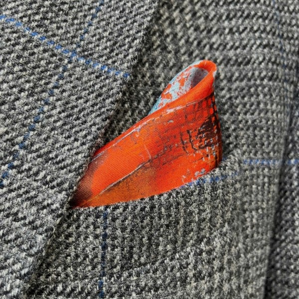 Spitfire silk pocket square in orange by Otway & Orford folded 3