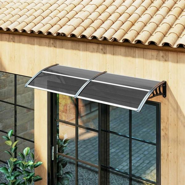 Black front door canopy awning with dual curved roof panels on wall-mounted brackets
