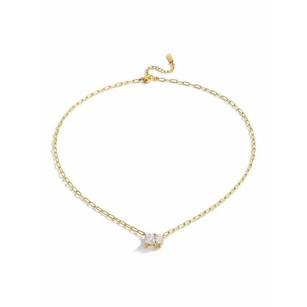 Gold necklace with a small pendant on a white background