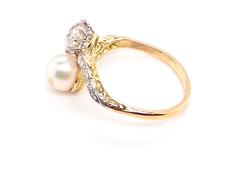 Vintage Tom A fine pearl and diamond two stone ring