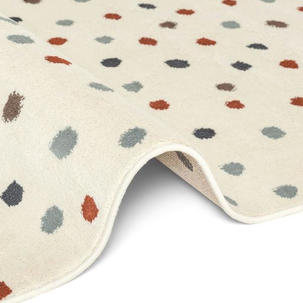 Beige rug with multicolored abstract pattern on a white background