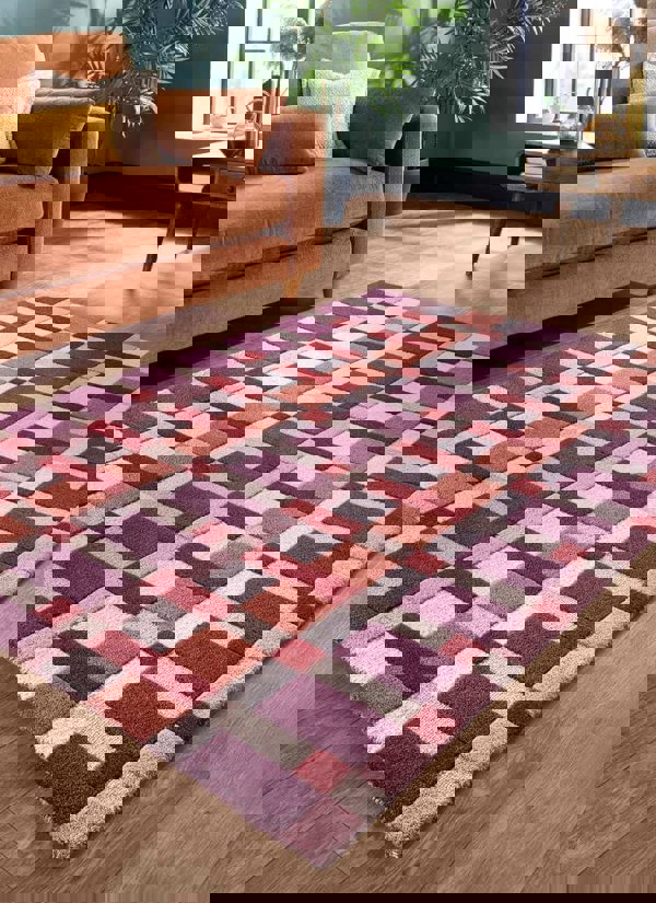 Hand-carved wool geometric rug in multicolours, featuring a bold block design, ideal for modern home decor.