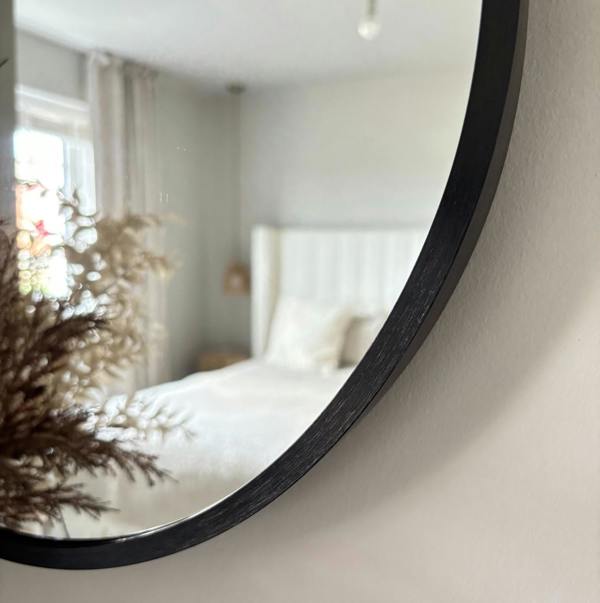 Downton Interiors Black Modern Metal Frame Oval Wall Mirror - 70cm
