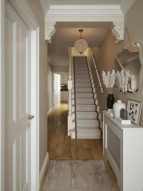 hallway view with marble handrail and colour matching stair rods