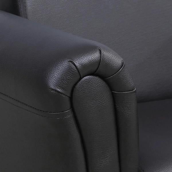 Black kids armchair close-up of upholstered armrest seam and cushion