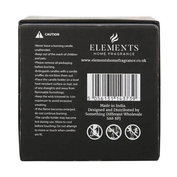 Candle packaging back with 'CAUTION' text, safety warnings, barcode and website