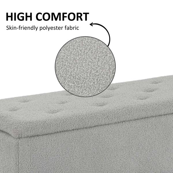 Grey padded storage ottoman bench with textured fabric surface