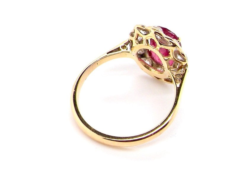 Vintage Tom A fine ruby and diamond cluster ring