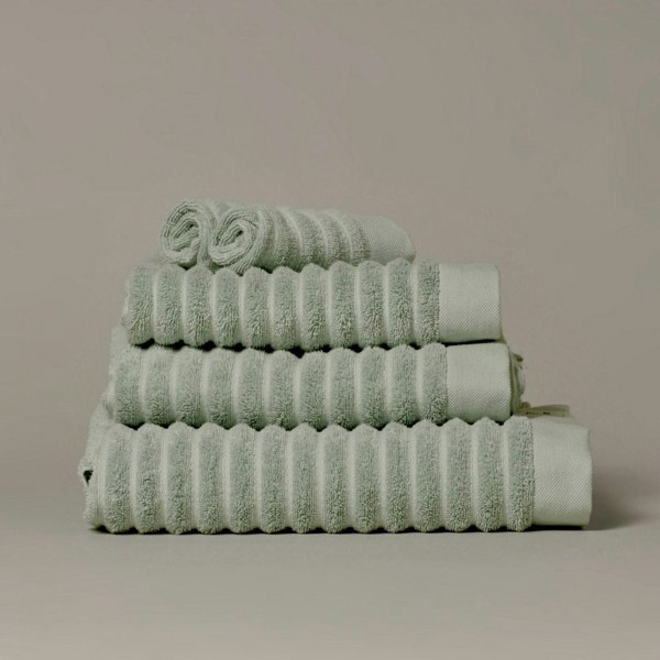 Organic cotton sage green bathroom towels. Super soft ribbed towels in four sizes: hand towel, bath towel, bath sheet and face cloths. 