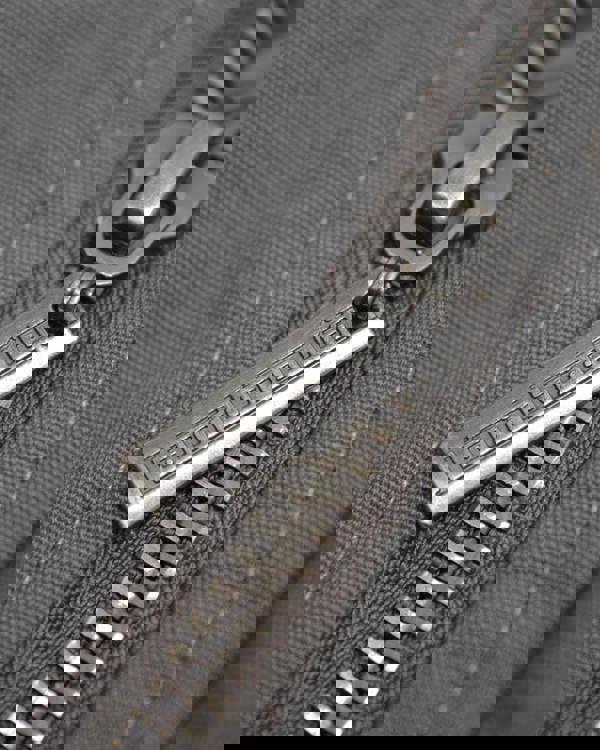 Lambretta Mens/Womens Carnaby Scooter Hooded Classic Mod Ska Badge Parka, close-up of metal zipper with Lambretta logo on it.