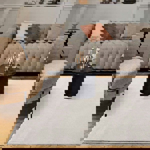 Living Room rug, cream colours, geometric, practicality in mind, the rug is anti-allergic.