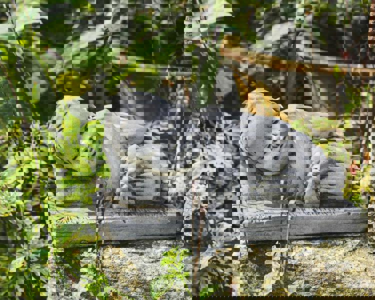 Charming Stone Cast Small Lying Monk in Robe