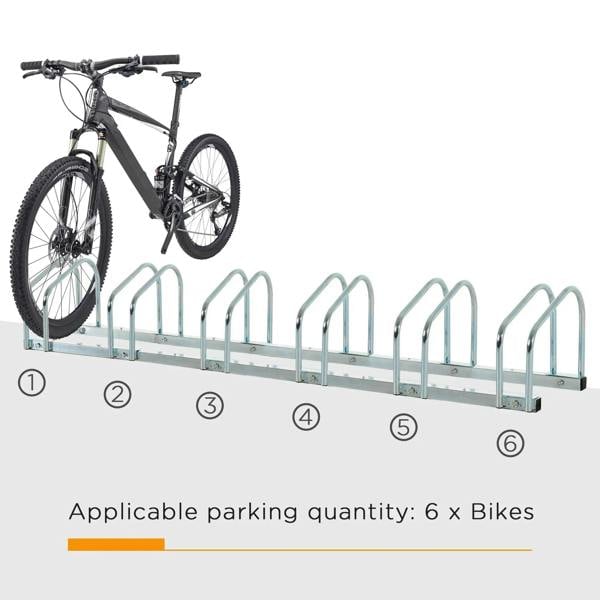 Silver bike parking rack holding two bicycles with six U-shaped wheel stands