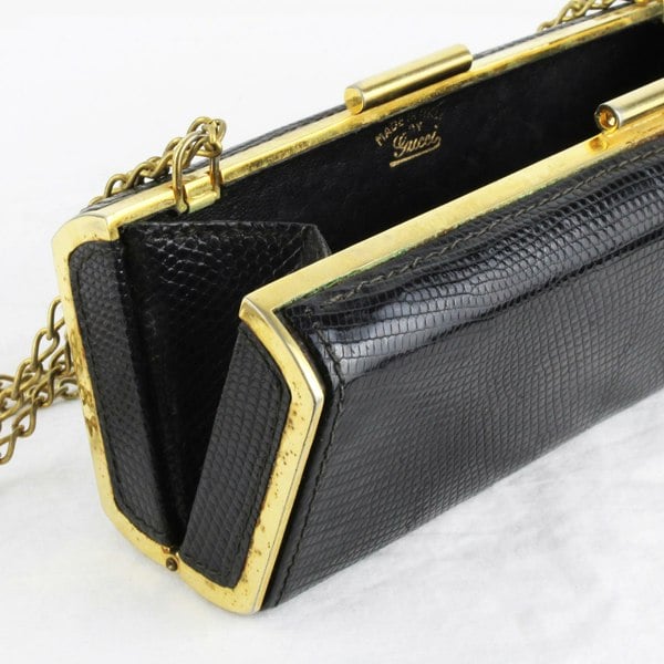 Vintage Gucci purse finished in black lizard leather