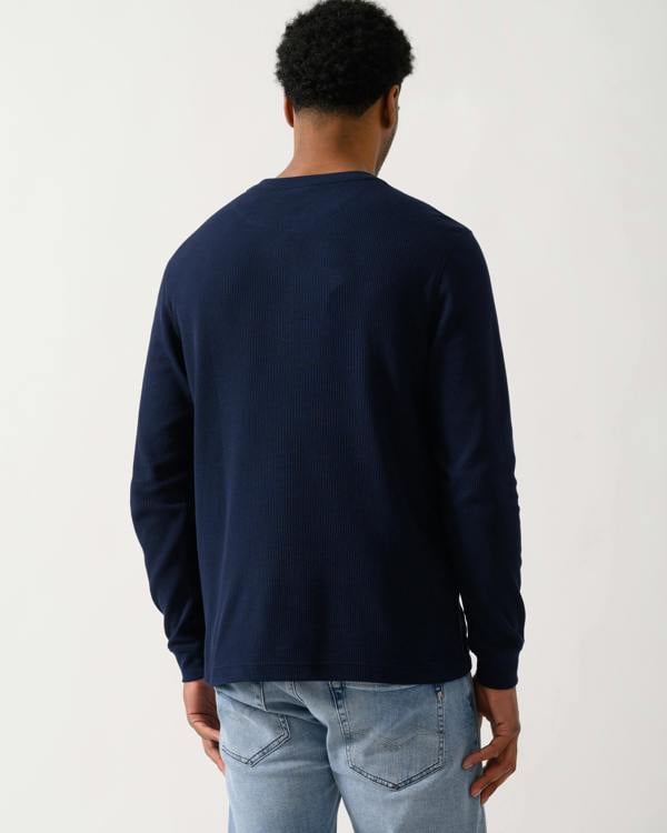 back view of a model wearing a Lacoste Boxy Tunisian Neck Mens Knit T-Shirt in Navy Blue 166