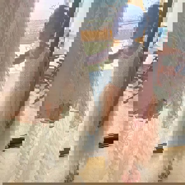 Young girl wearing pretty dress 