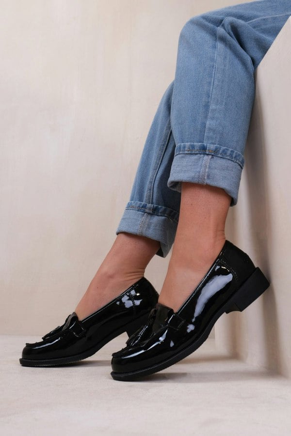 Where's That From Imogen Flatform Slip on Loafers Shoes With Tassle in Black Patent Faux Leather