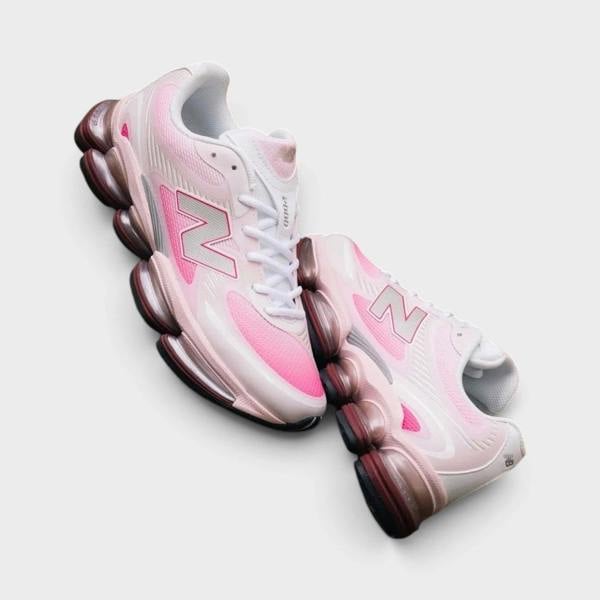 Supplied Fashion New Balance Abzorb 2000 sneakers in pink with mesh upper and responsive shock-absorbing midsole.