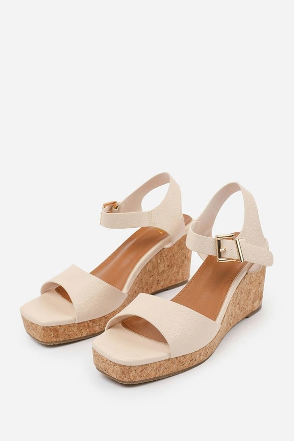 Where's That From Giselle  Wedge Sandals With Buckle Ankle Strap in Cream Grain Pu