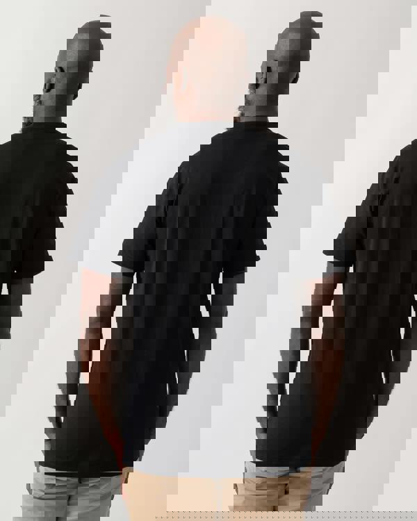 back shot of a model wearing a Belstaff Surface Mens T-Shirt in Black