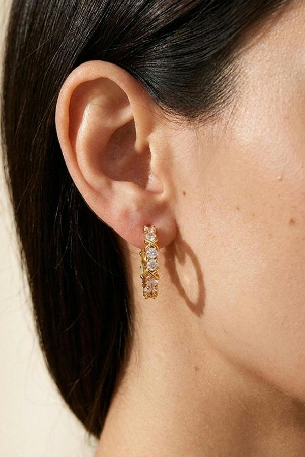 ARIIRA Lorelei Gold Tone Crystal Criss Cross Hoop Earrings