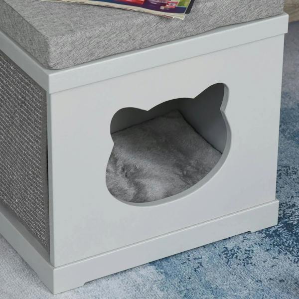 Grey interior cushion cat cave on a white cat house cube with cat-shaped front opening