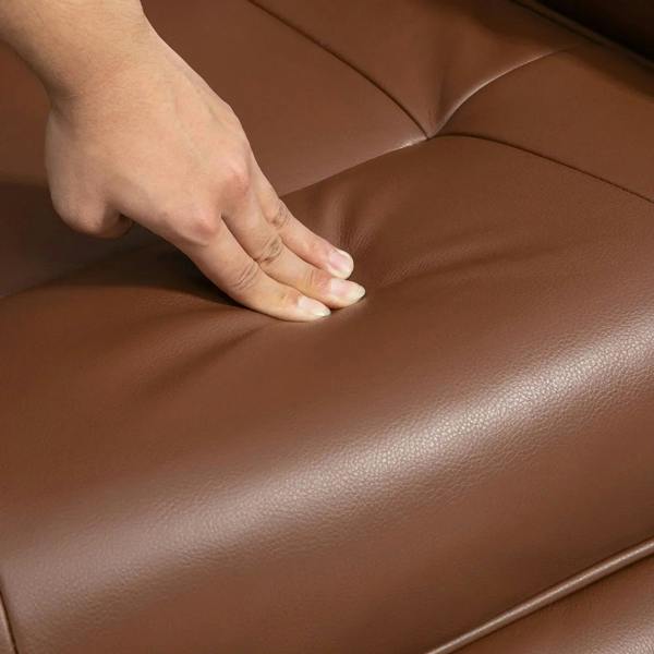 Brown faux leather recliner seat cushion with hand pressing padded upholstery