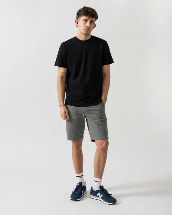 full length shot of a model wearing a Parajumpers Shispare Mens T-Shirt in Black 541