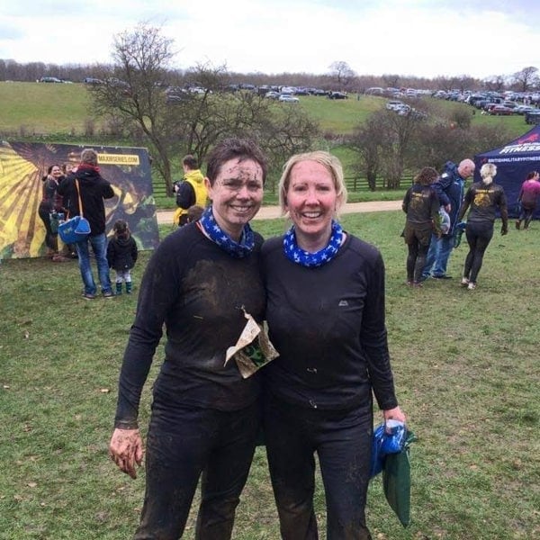 Runners wearing Ruffnek scarf around their necks after completing the Major series Mud run! Ruffnek.