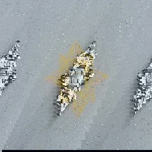 Gold brooch, star shaped design with textured finish, vintage inspired style, secure pin fastening, classic jewellery accessory, elegant statement brooch, timeless gift for her
