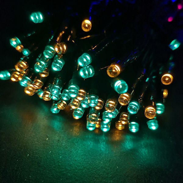 Samuel Alexander 100 LED 10m Premier Christmas Indoor Outdoor Multi Function Battery Operated String Lights with Timer in Multicoloured