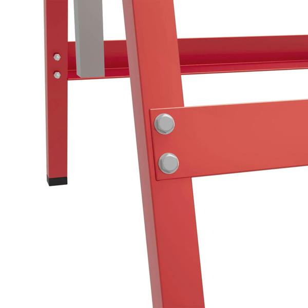 Close-up of red steel sawhorse frame with gray mounting holes and two metal fasteners