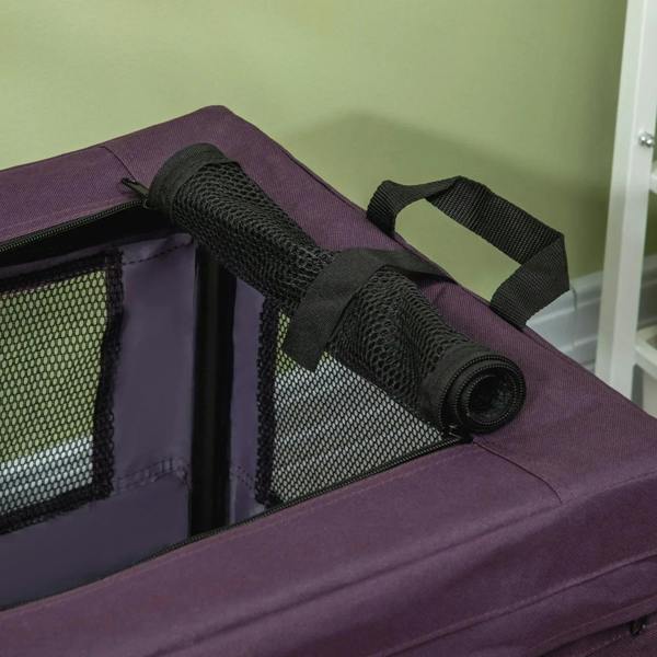 Purple pet carrier top edge with rolled black mesh panel and fabric strap